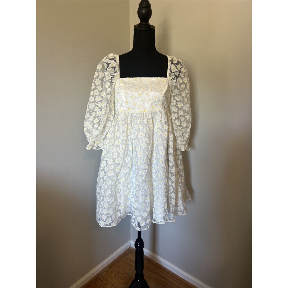 "Roadside Daisy Babydoll Dress" from Vada Winter